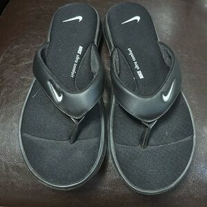 Nike cusion flip flops.  Black women's 9